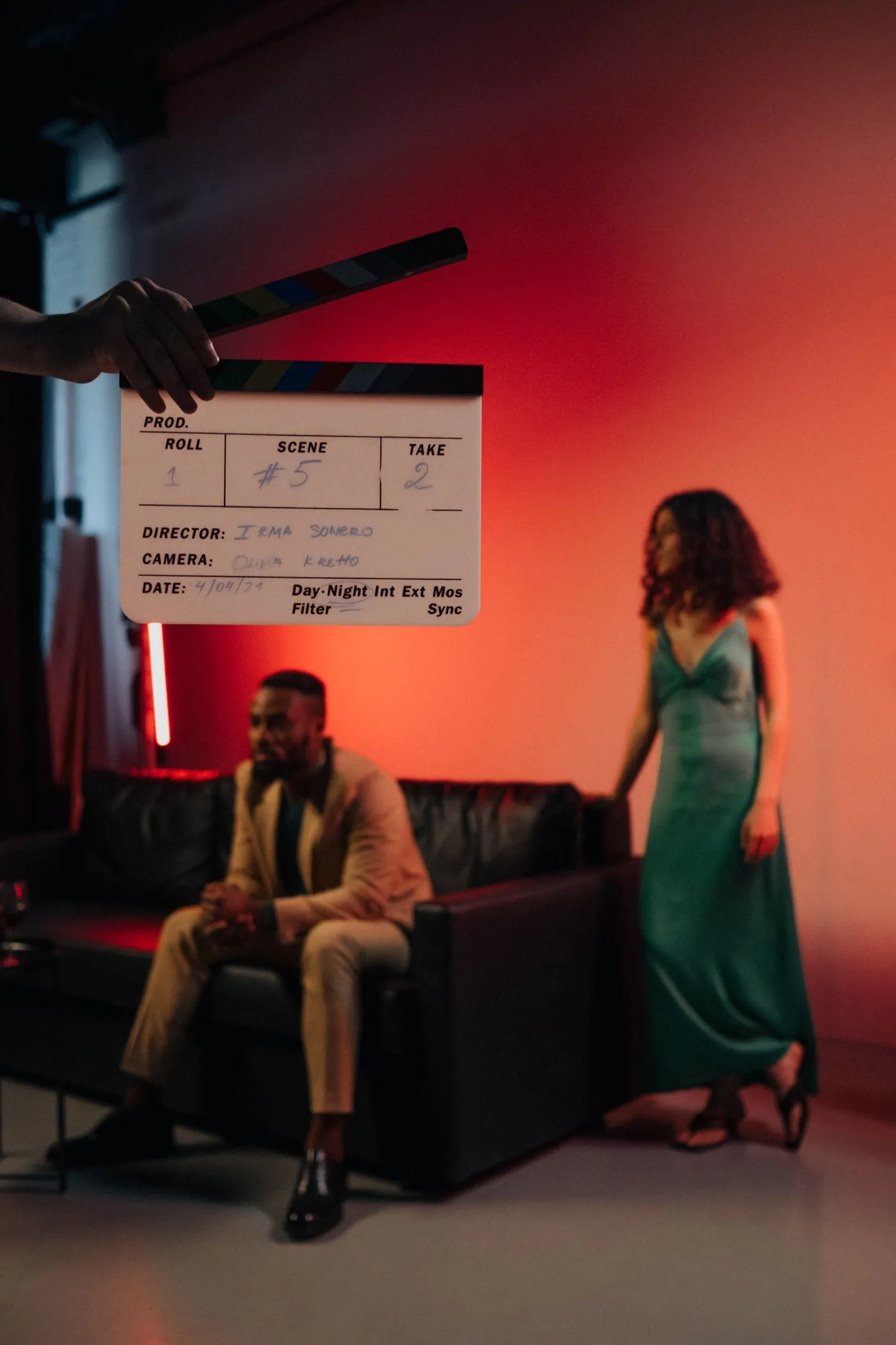 Actors and crew on a film set between takes